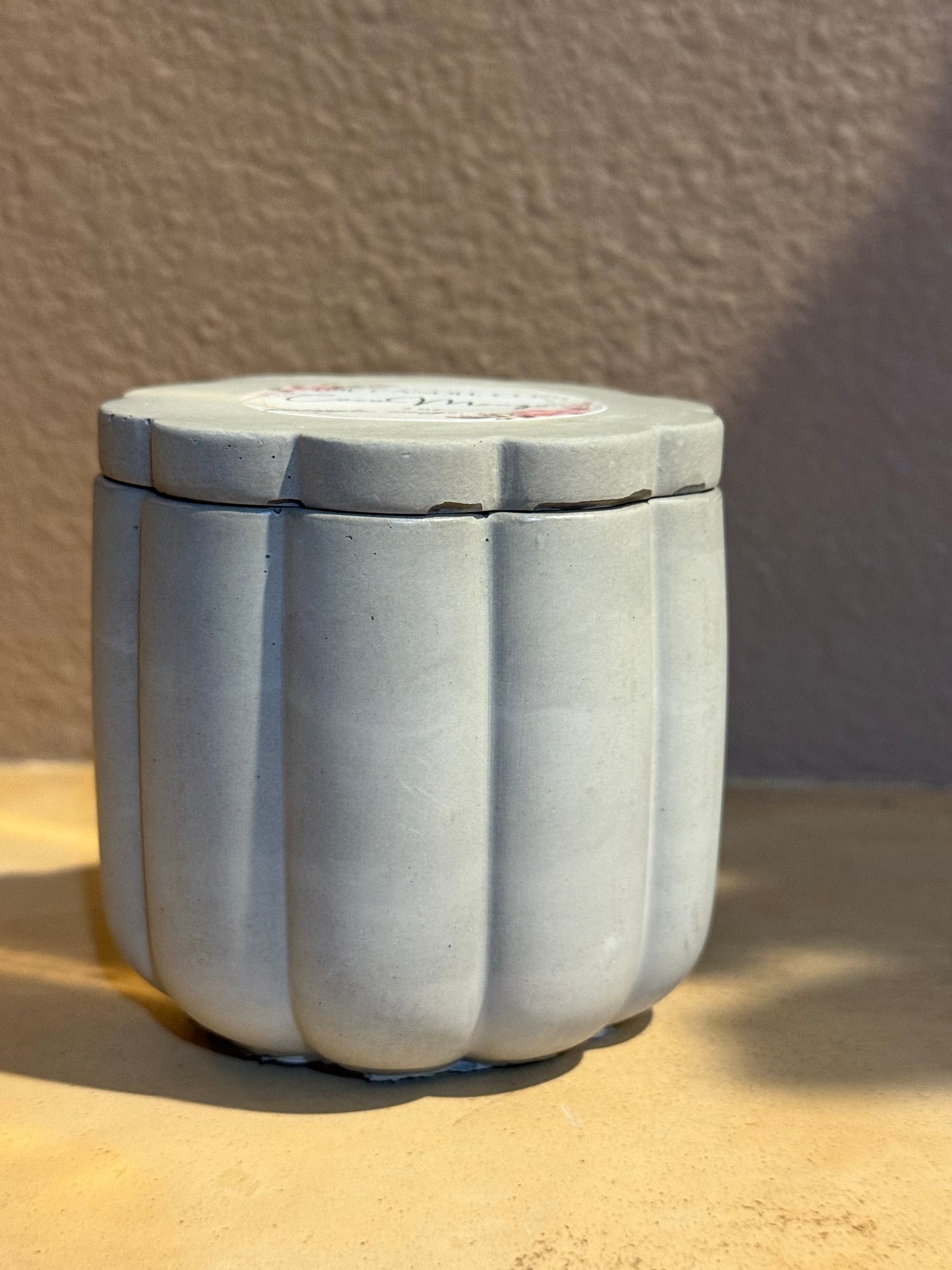 Flower cement shaped candle