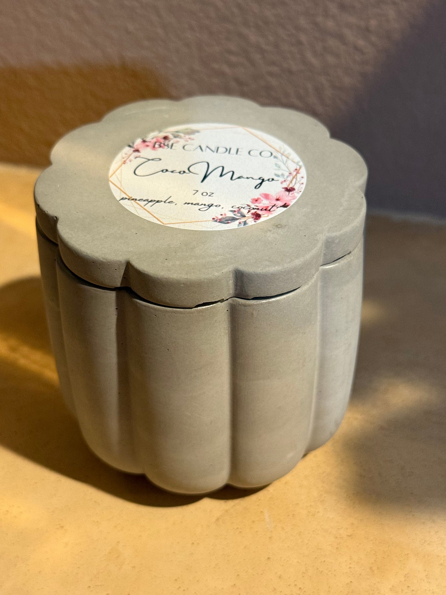 Flower cement shaped candle