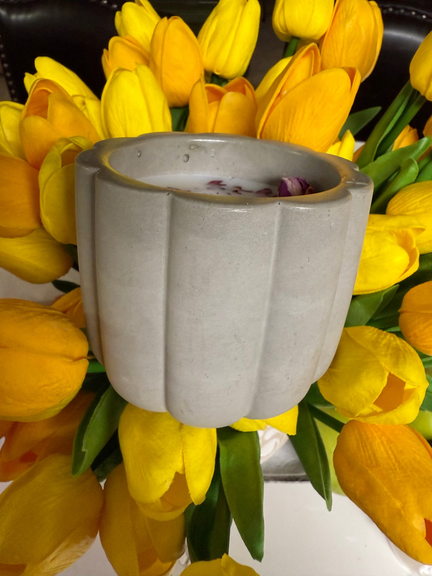 Flower cement shaped candle